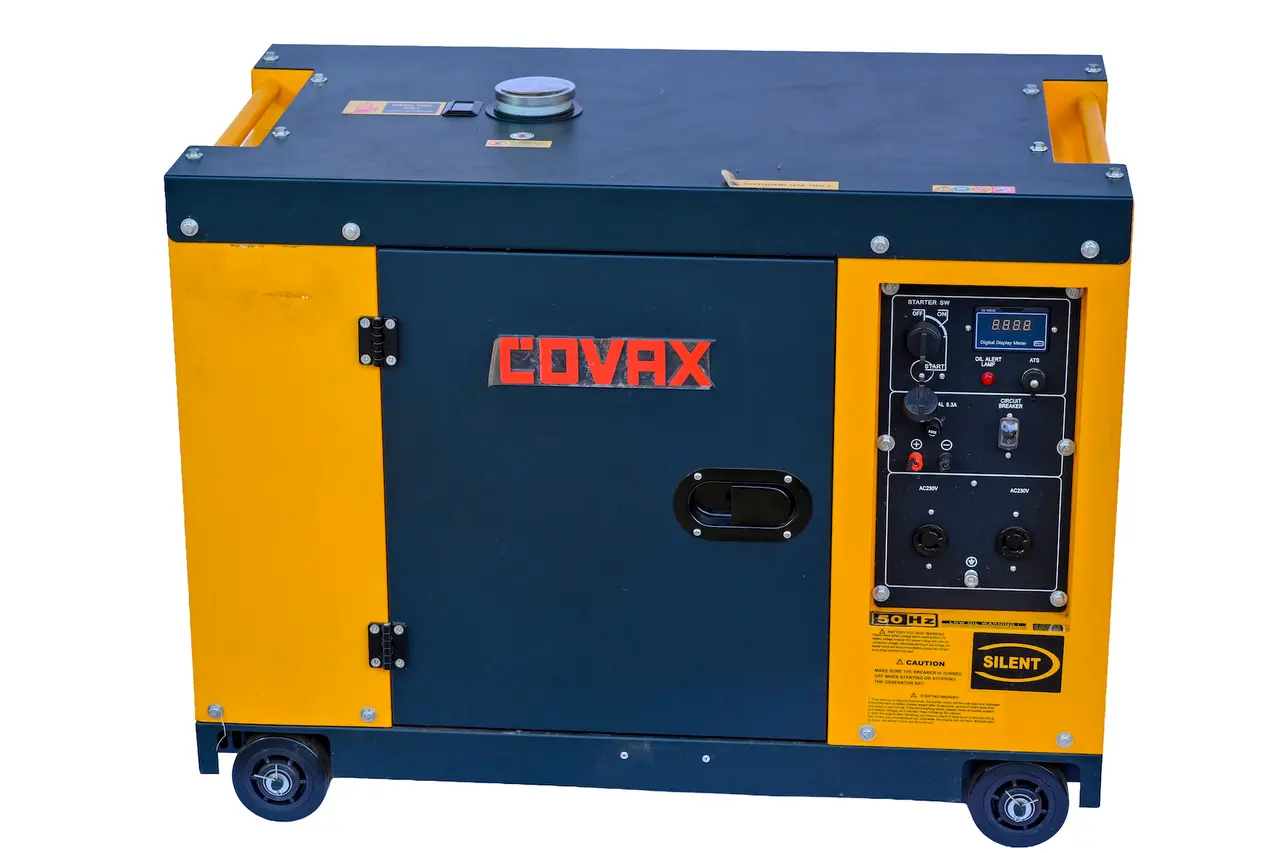 Top view of COVAX silent generator highlighting the diesel tank cap and top exhaust