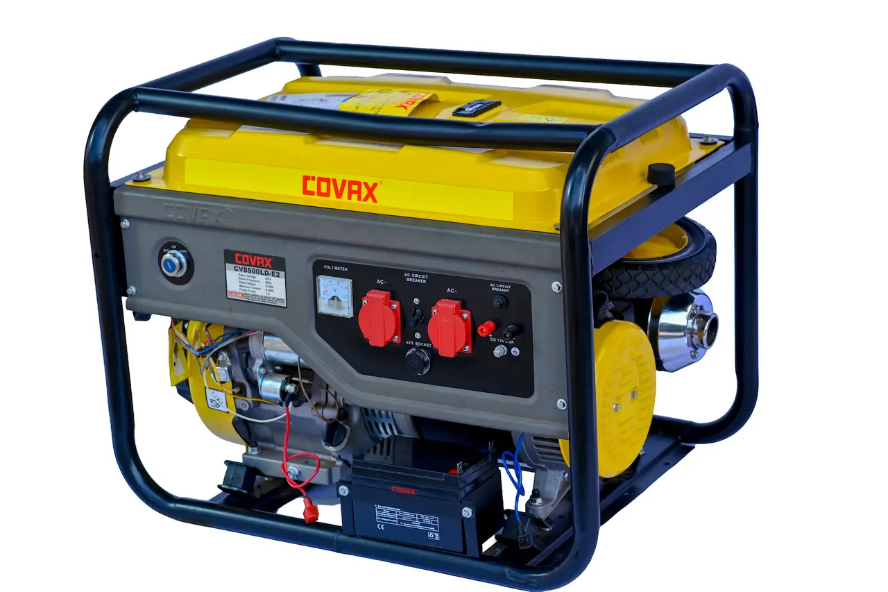 Rear angle of the COVAX generator highlighting the attached heavy-duty wheel kit and exhaust