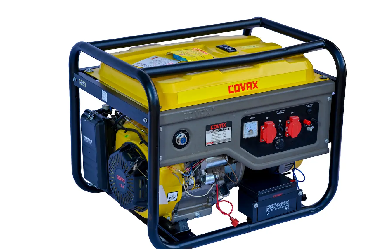 Front panel view of the COVAX CV8500LD-E2 6.5kW petrol generator showing AC sockets, ATS plug, and voltmeter