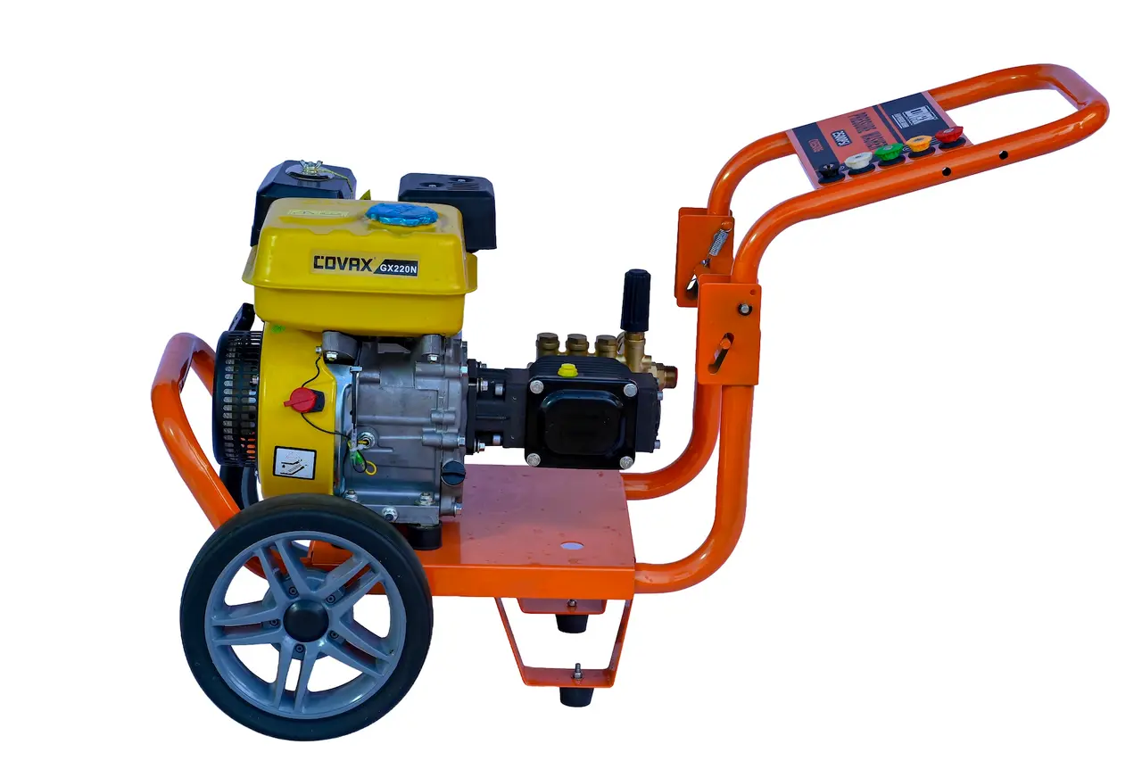 Side profile of COVAX CV2500G showing engine, brass pump manifold and heavy duty wheels