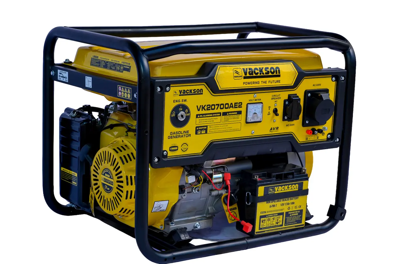 Side profile of the Vackson VK20700AE2 generator showing the 17HP engine, exhaust assembly, and copper alternator casing.