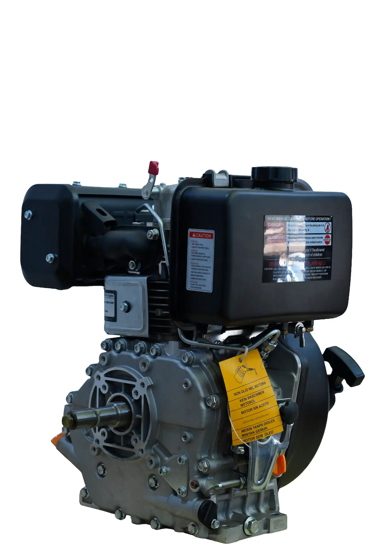 Angled view of the Covax KM186FA engine showing the keyed output shaft and yellow warning tag.